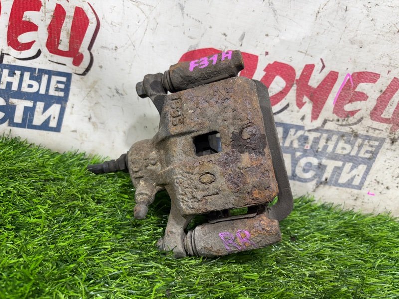 Суппорт MITSUBISHI DIAMANTE F31A 6G73 задний правый (б/у)