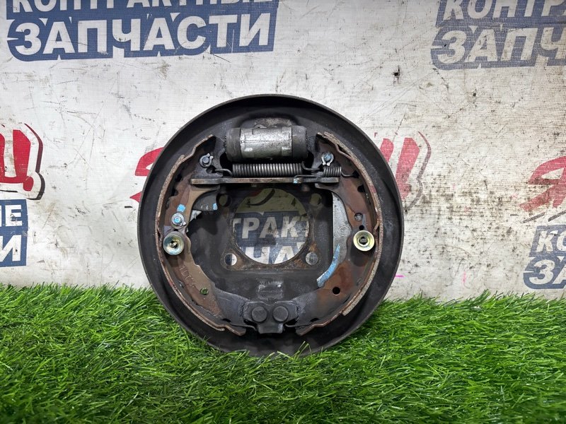 Механизм стояночного тормоза TOYOTA PLATZ NCP12 1NZ-FE задний левый (б/у)