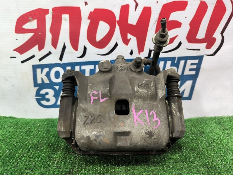 Суппорт NISSAN MARCH K13 HR12DE передний левый (б/у)