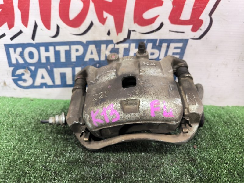 Суппорт NISSAN MARCH K13 HR12DE передний левый (б/у)