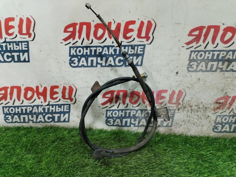 Тросик ручника HONDA FIT ARIA GD8 L15A левый (б/у)