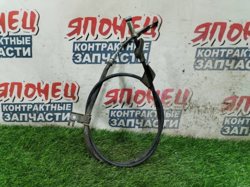 Тросик ручника HONDA FIT ARIA GD8 L15A левый (б/у)