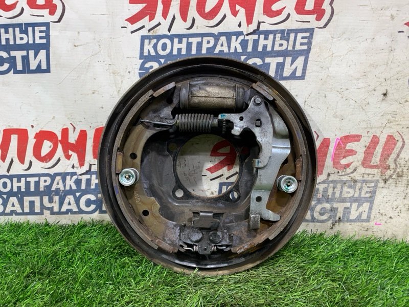 Механизм стояночного тормоза TOYOTA IPSUM SXM10 3S-FE задний левый (б/у)