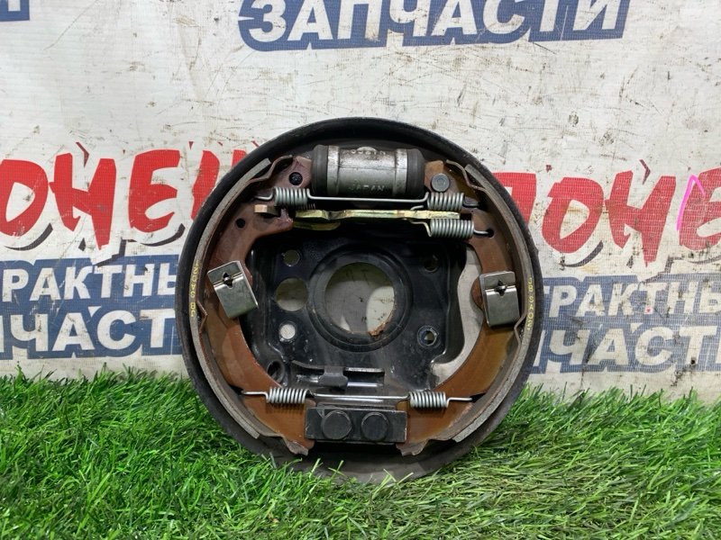 Механизм стояночного тормоза SUZUKI SWIFT HT51S M13A задний левый (б/у)