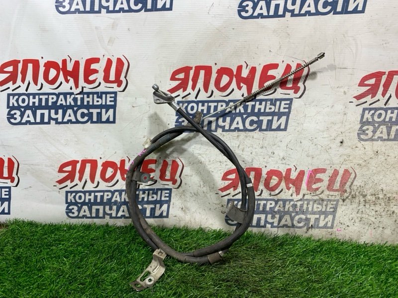 Тросик ручника TOYOTA RACTIS NCP125 1NZ-FE левый (б/у)