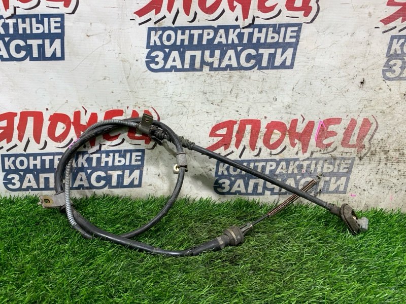 Тросик ручника SUZUKI AERIO RD51S M18A левый (б/у)