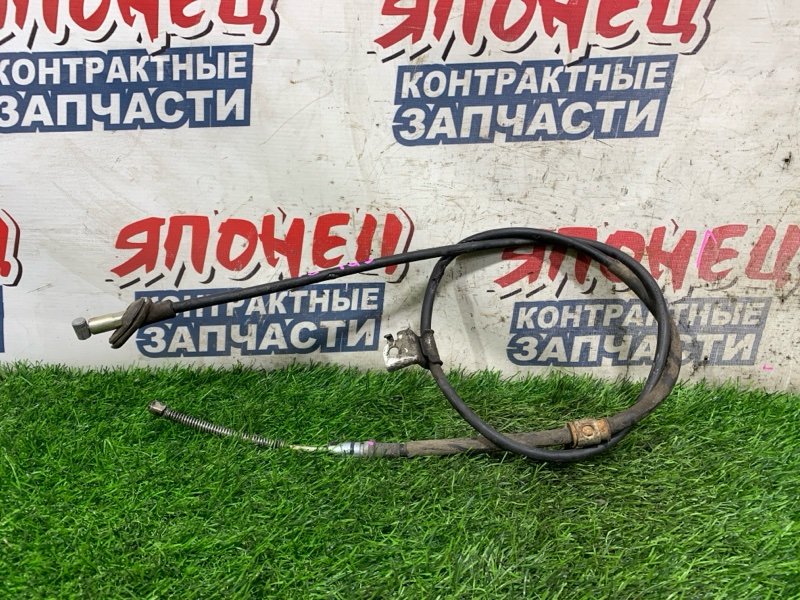 Тросик ручника HONDA FIT GD1 L13A левый (б/у)