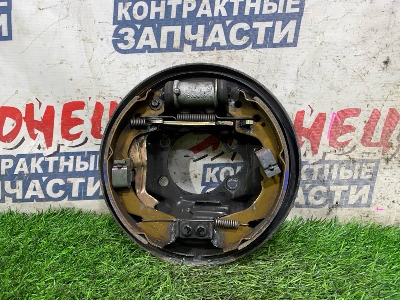 Механизм стояночного тормоза SUZUKI AERIO RD51S M18A задний правый (б/у)