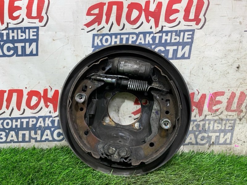Механизм стояночного тормоза TOYOTA PASSO SETTE M502E 3SZ-VE задний левый (б/у)