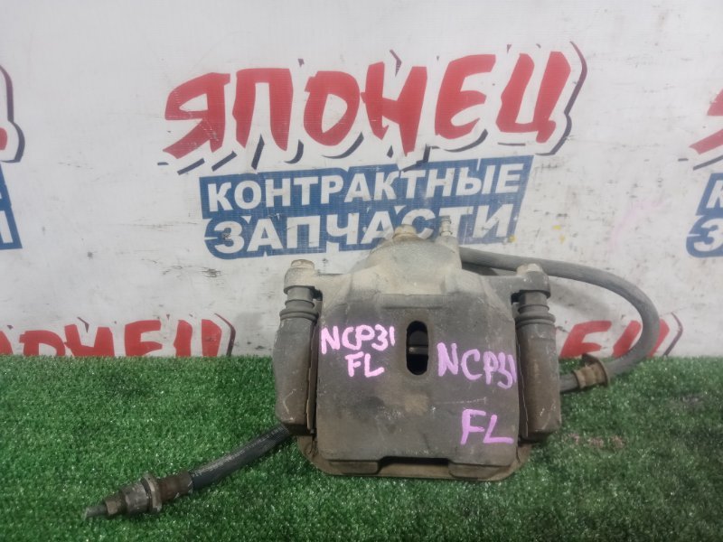 Суппорт TOYOTA BB NCP31 1NZ-FE передний левый (б/у)