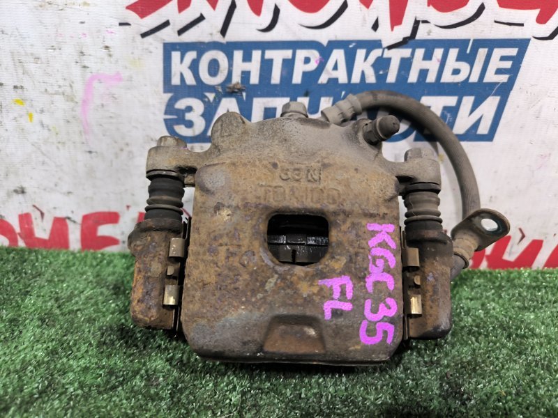 Суппорт TOYOTA PASSO KGC35 1KR-FE передний левый (б/у)