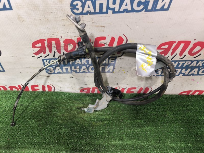 Тросик ручника TOYOTA RACTIS NCP100 1NZ-FE левый (б/у)