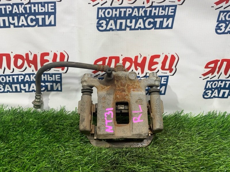 Суппорт NISSAN X-TRAIL NT31 MR20DE задний левый (б/у)