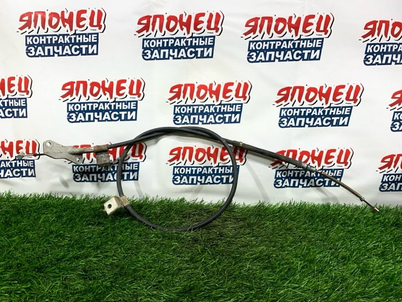 Тросик ручника HONDA LOGO GA3 D13B левый (б/у)