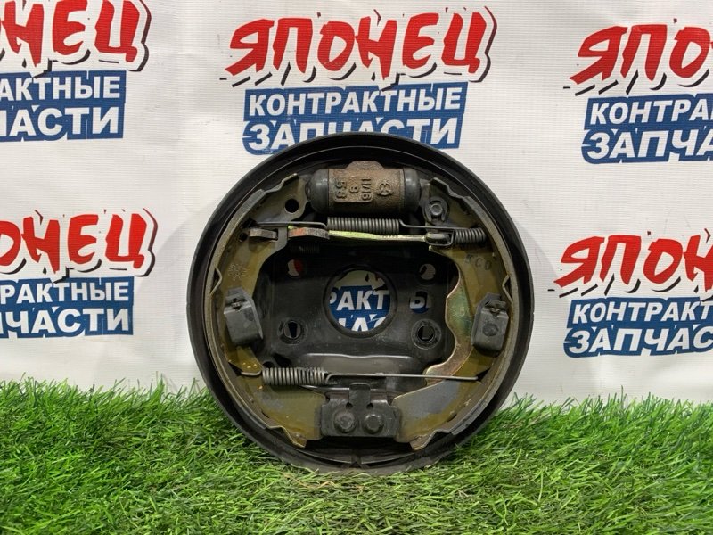 Механизм стояночного тормоза HONDA LOGO GA3 D13B задний левый (б/у)