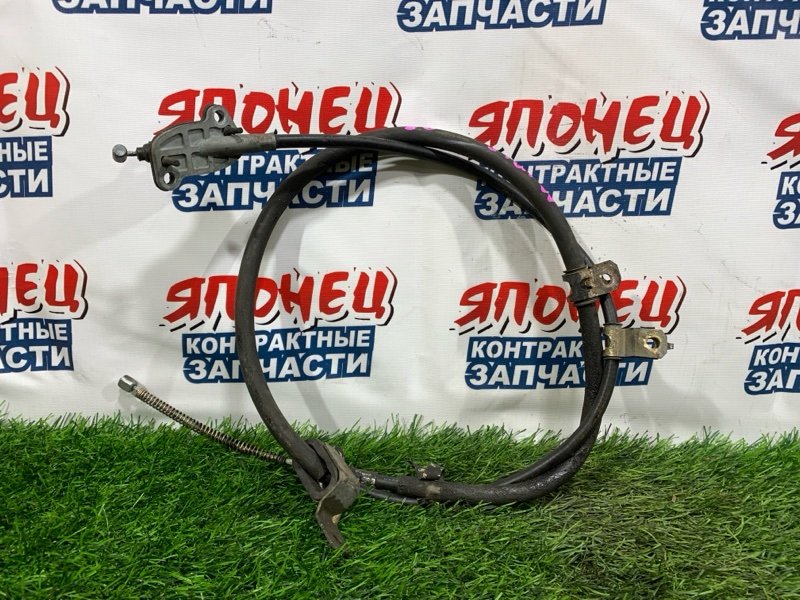 Тросик ручника DAIHATSU STORIA M101S K3-VE левый (б/у)