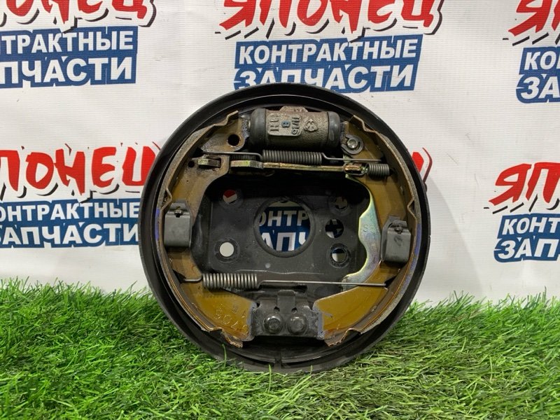 Механизм стояночного тормоза HONDA LOGO GA3 D13B задний левый (б/у)