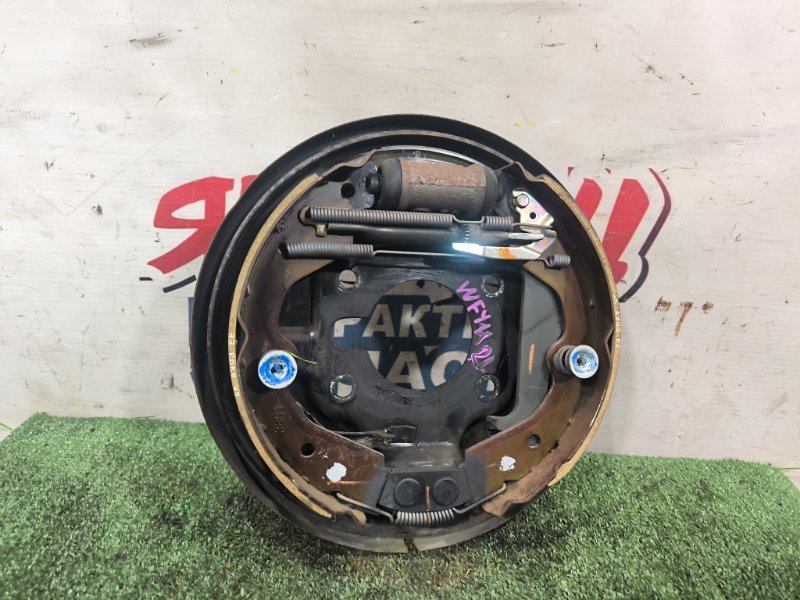 Механизм стояночного тормоза NISSAN WINGROAD WFY11 QG15DE задний левый (б/у)