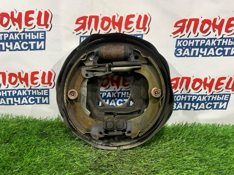 Механизм стояночного тормоза NISSAN WINGROAD Y12 HR15DE задний правый (б/у)