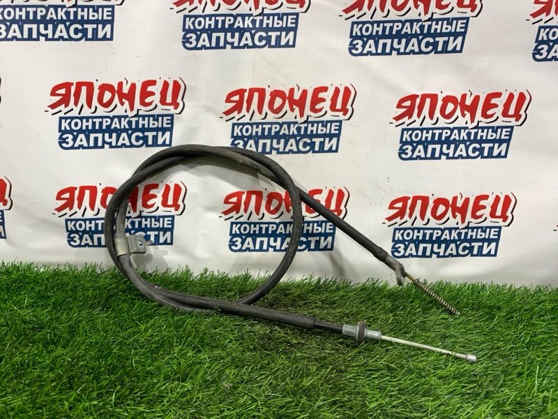 Тросик ручника NISSAN WINGROAD Y12 HR15DE левый (б/у)