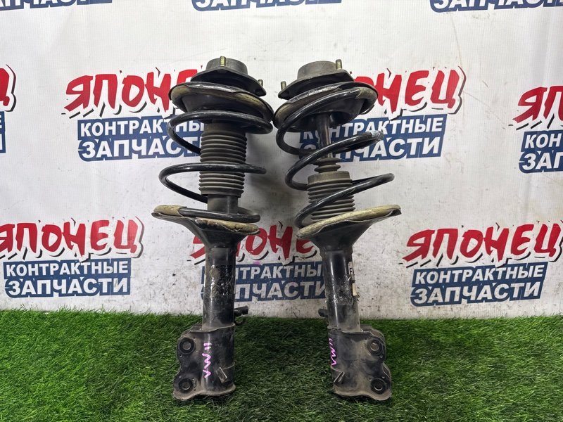 Стойка NISSAN EXPERT VW11 QG18DE передняя (б/у)