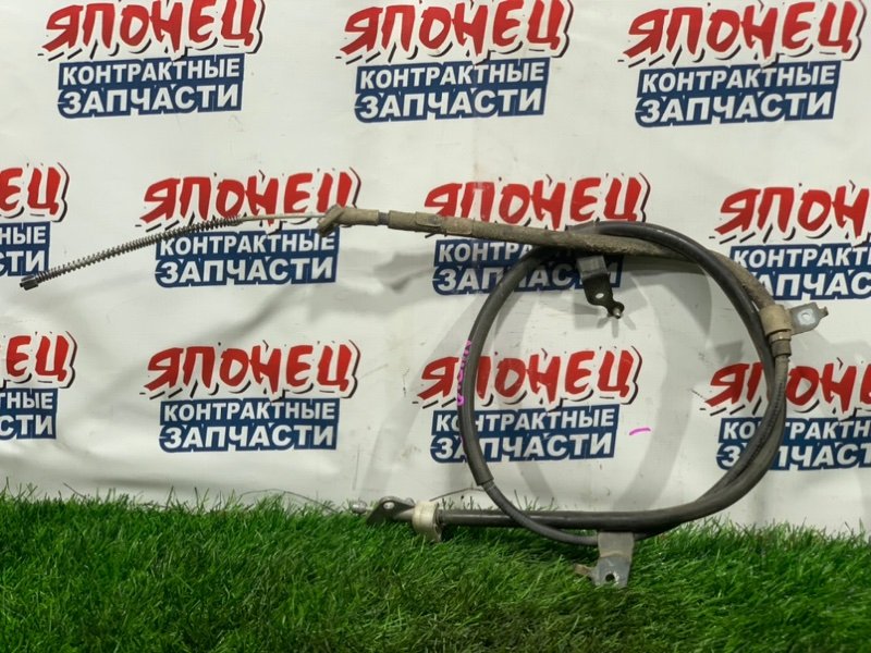 Тросик ручника TOYOTA AQUA NHP10 1NZ-FXE левый (б/у)