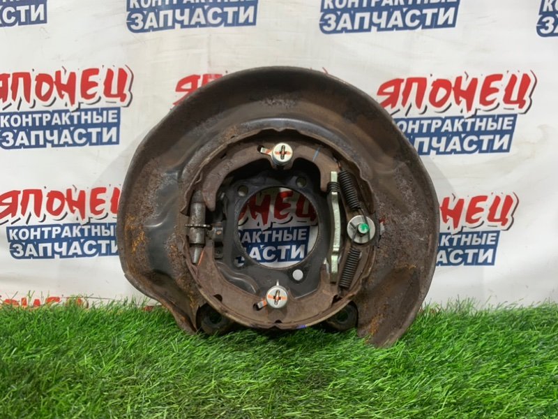 Механизм стояночного тормоза TOYOTA VOXY ZRR70 3ZR-FE задний левый (б/у)