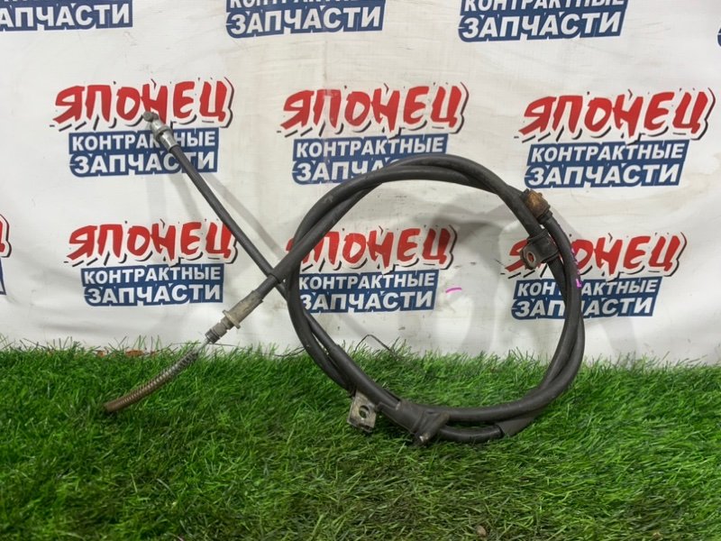 Тросик ручника MITSUBISHI DIAMANTE F34A 6A13 левый (б/у)