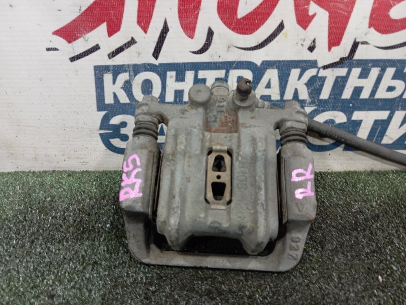 Суппорт HONDA STEPWGN RK5 R20A задний правый (б/у)
