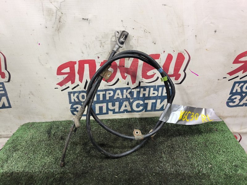 Тросик ручника TOYOTA PASSO KGC30 1KR-FE левый (б/у)