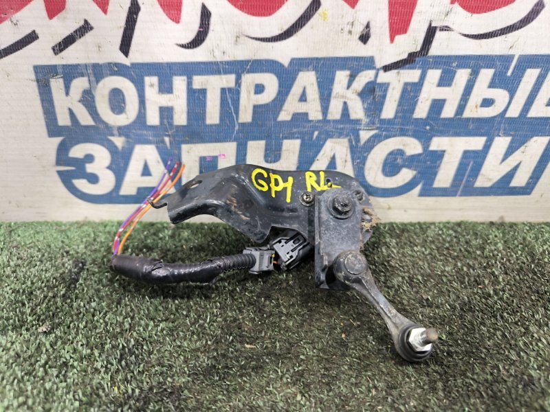 Датчик высоты дорожного просвета HONDA FIT GP1 LDA задний (б/у)
