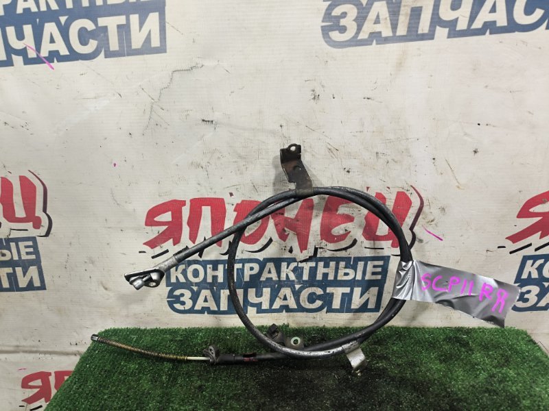Тросик ручника TOYOTA PLATZ SCP11 1SZ-FE задний правый (б/у)