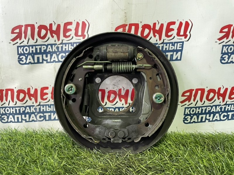 Механизм стояночного тормоза TOYOTA OPA ZCT10 1ZZ-FE задний левый (б/у)