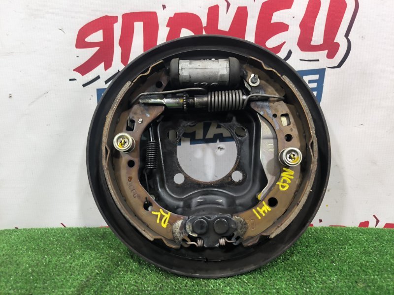 Механизм стояночного тормоза TOYOTA SPADE NCP141 1NZ-FE задний левый (б/у)