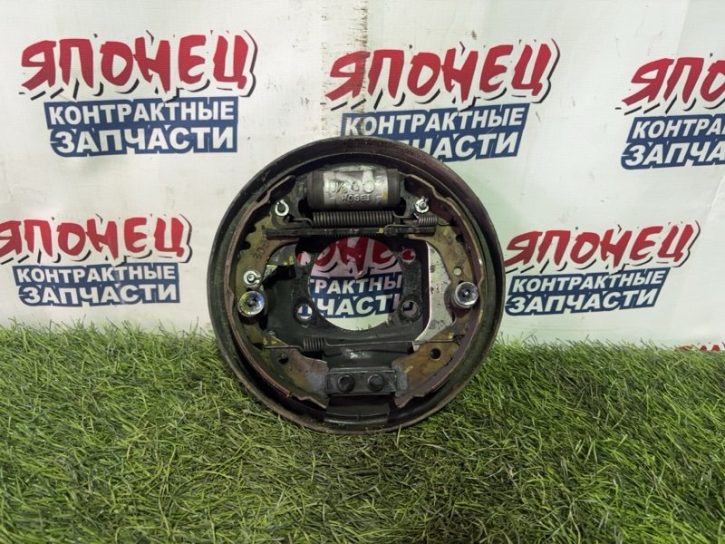 Механизм стояночного тормоза TOYOTA PASSO KGC35 1KR-FE задний левый (б/у)