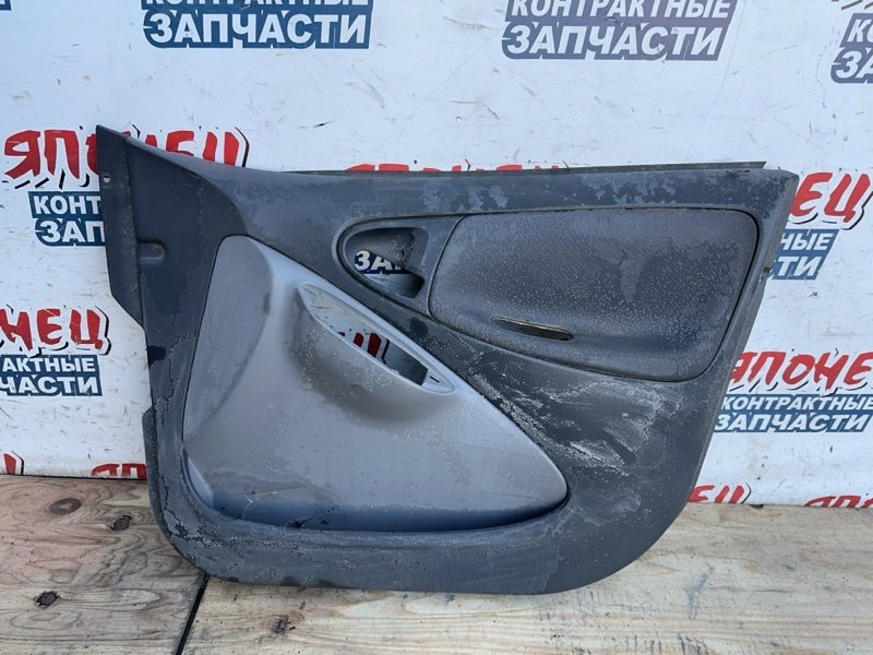 Обшивка двери TOYOTA VITZ SCP10 1SZ-FE передняя правая (б/у)