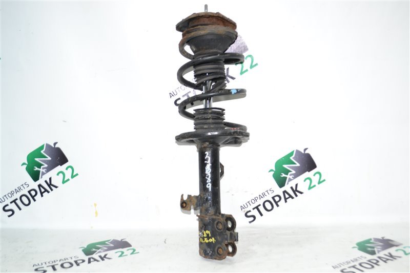 Стойка Toyota Corolla NZE124 2002 передняя левая (б/у)