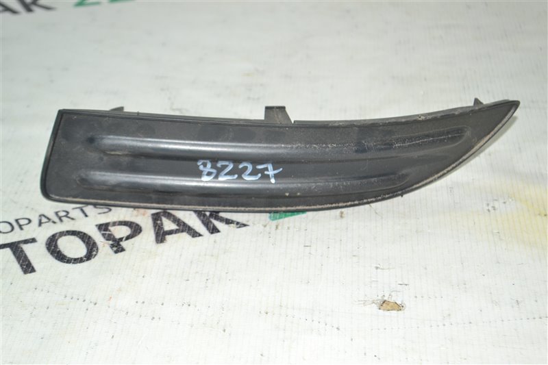 Заглушка бампера Toyota Corolla NZE121 1NZ 2001 передняя левая (б/у)