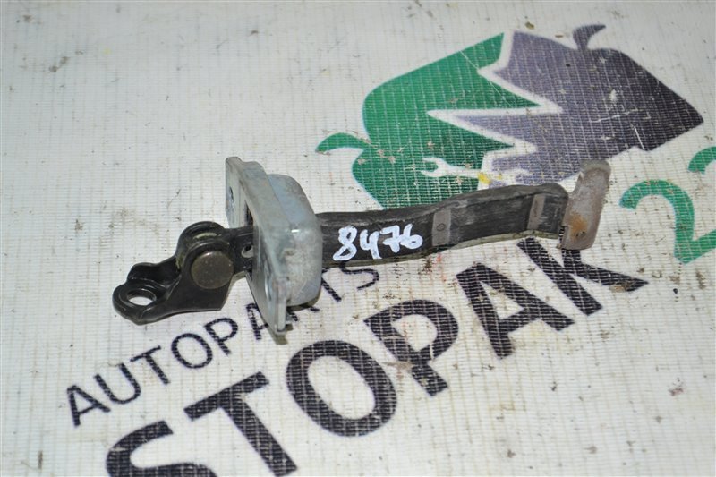 Ограничитель двери Toyota Runx NZE121 1NZ-FE 2002 передний (б/у)