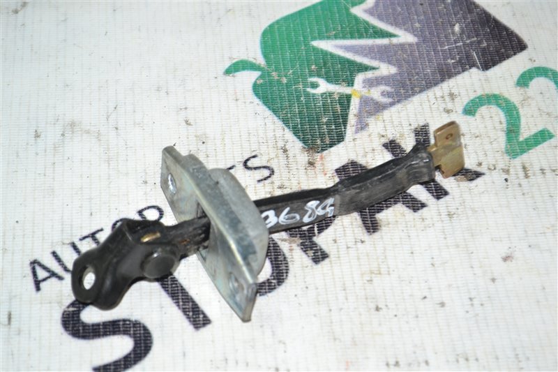 Ограничитель двери Toyota Corolla NZE124 2002 задний (б/у)