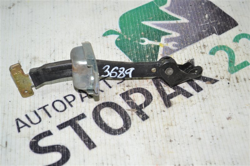 Ограничитель двери Toyota Corolla NZE124 2002 задний (б/у)