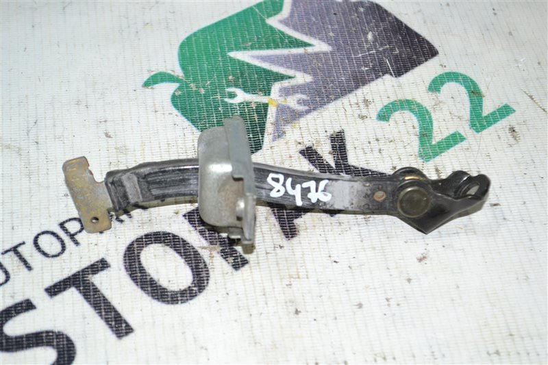 Ограничитель двери Toyota Runx NZE121 1NZ-FE 2002 задний (б/у)