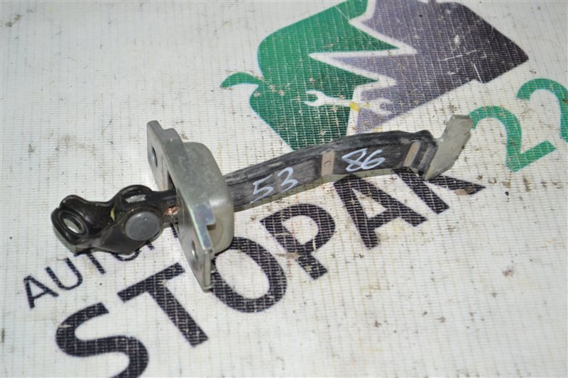 Ограничитель двери Toyota Corolla Runx NZE121 1NZ-FE 2006 задний (б/у)