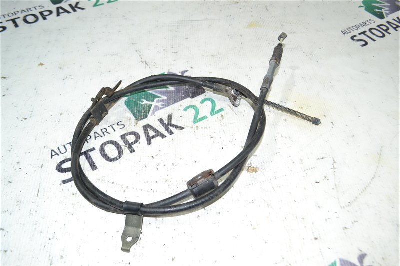 Трос ручника Toyota Corolla NZE121 1NZ-FE 2001 задний левый (б/у)