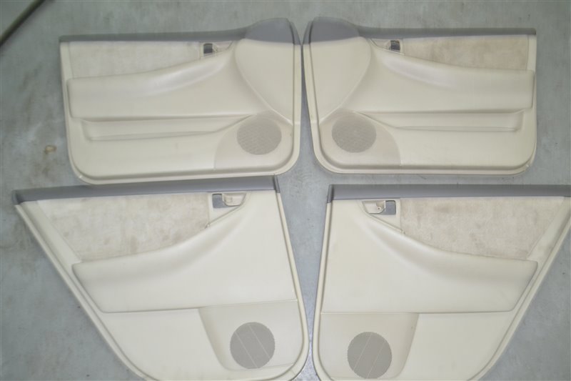 Обшивка дверей (Комплект) Toyota Corolla NZE124 1NZ-FE 2000 (б/у)