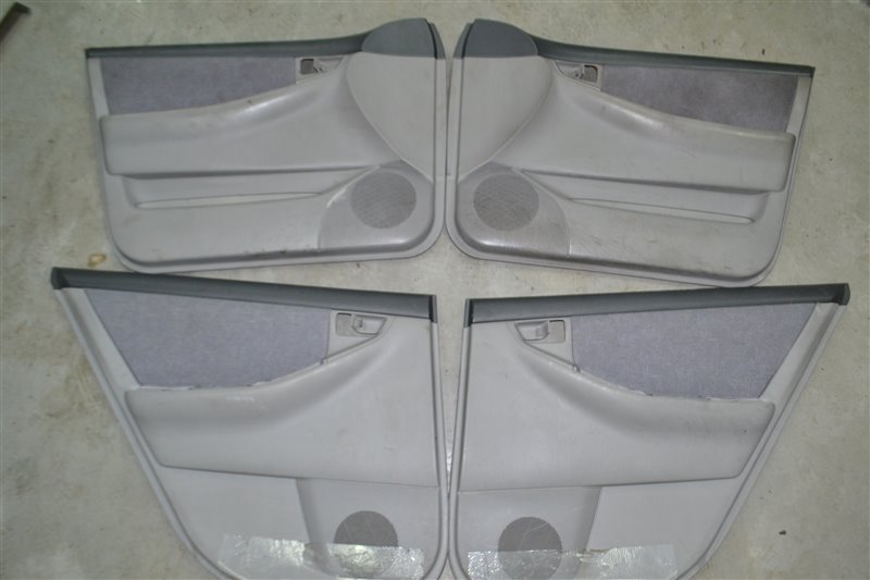 Обшивка дверей (Комплект) Toyota Corolla NZE121 1NZ 2001 (б/у)