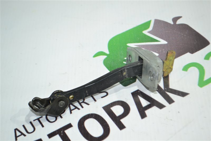 Ограничитель двери Toyota Corolla NZE124 1NZ 2005 задний (б/у)