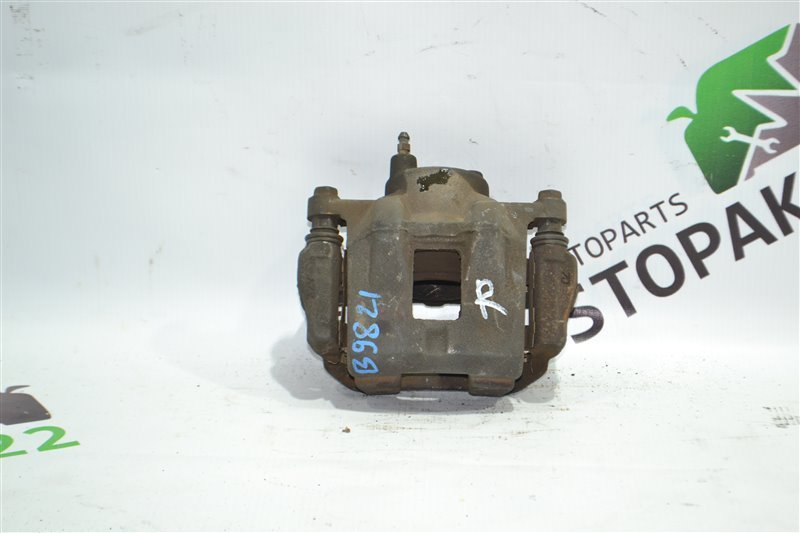 Суппорт Toyota Fielder NZE121 1NZ 2002 передний правый (б/у) Суппорт Toyota Fielder NZE121 1NZ 2002 передний правый (б/у)