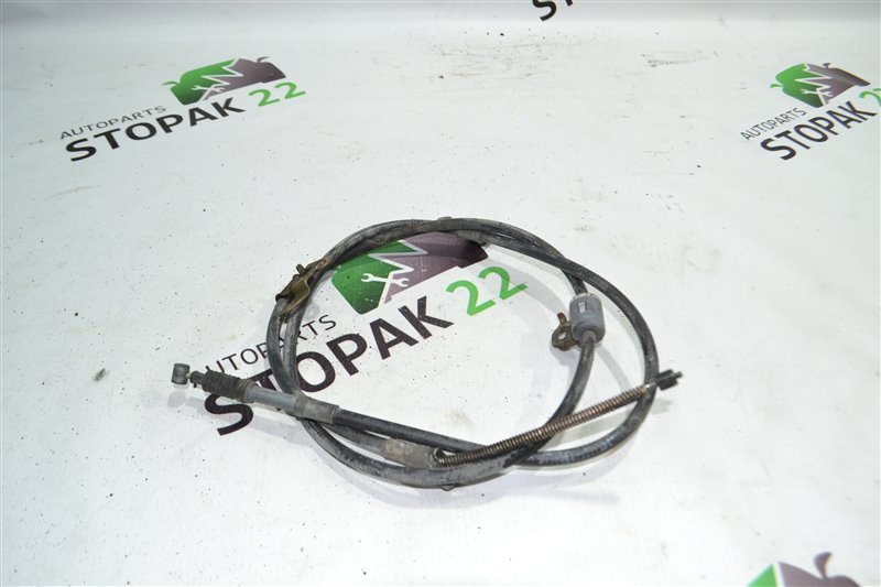 Трос ручника Toyota Corolla NZE121 1NZ 2004 задний правый (б/у) Трос ручника Toyota Corolla NZE121 1NZ 2004 задний правый (б/у)