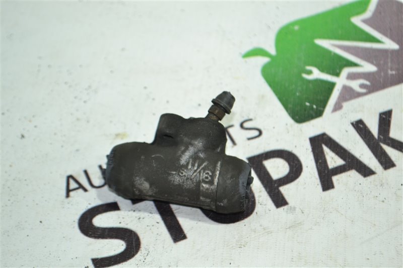 Рабочий тормозной цилиндр Toyota Corolla NZE121 1NZ 2002 задний левый (б/у) Рабочий тормозной цилиндр Toyota Corolla NZE121 1NZ 2002 задний левый (б/у)